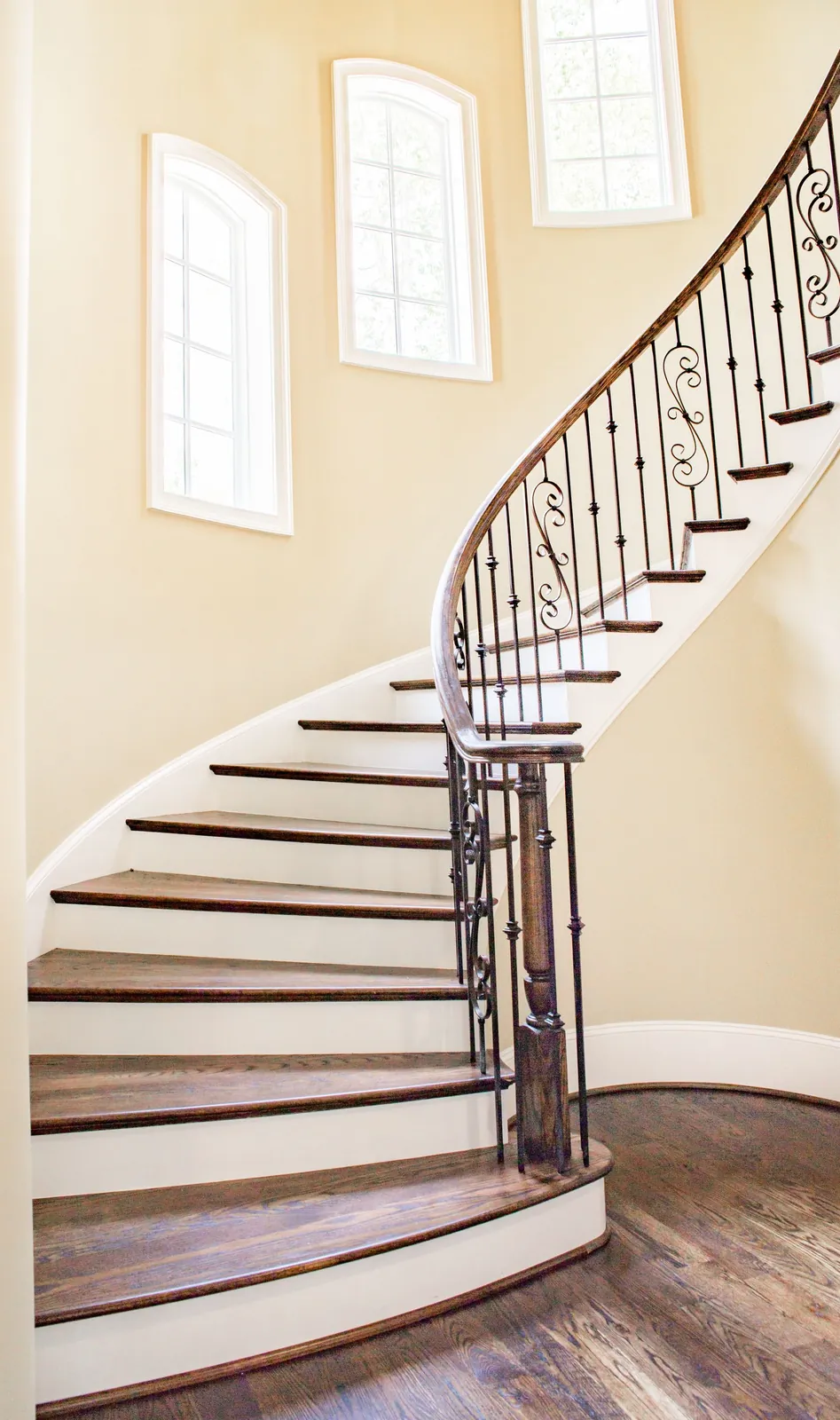 Fixed uPVC windows with Georgian bars lighting a stairwell