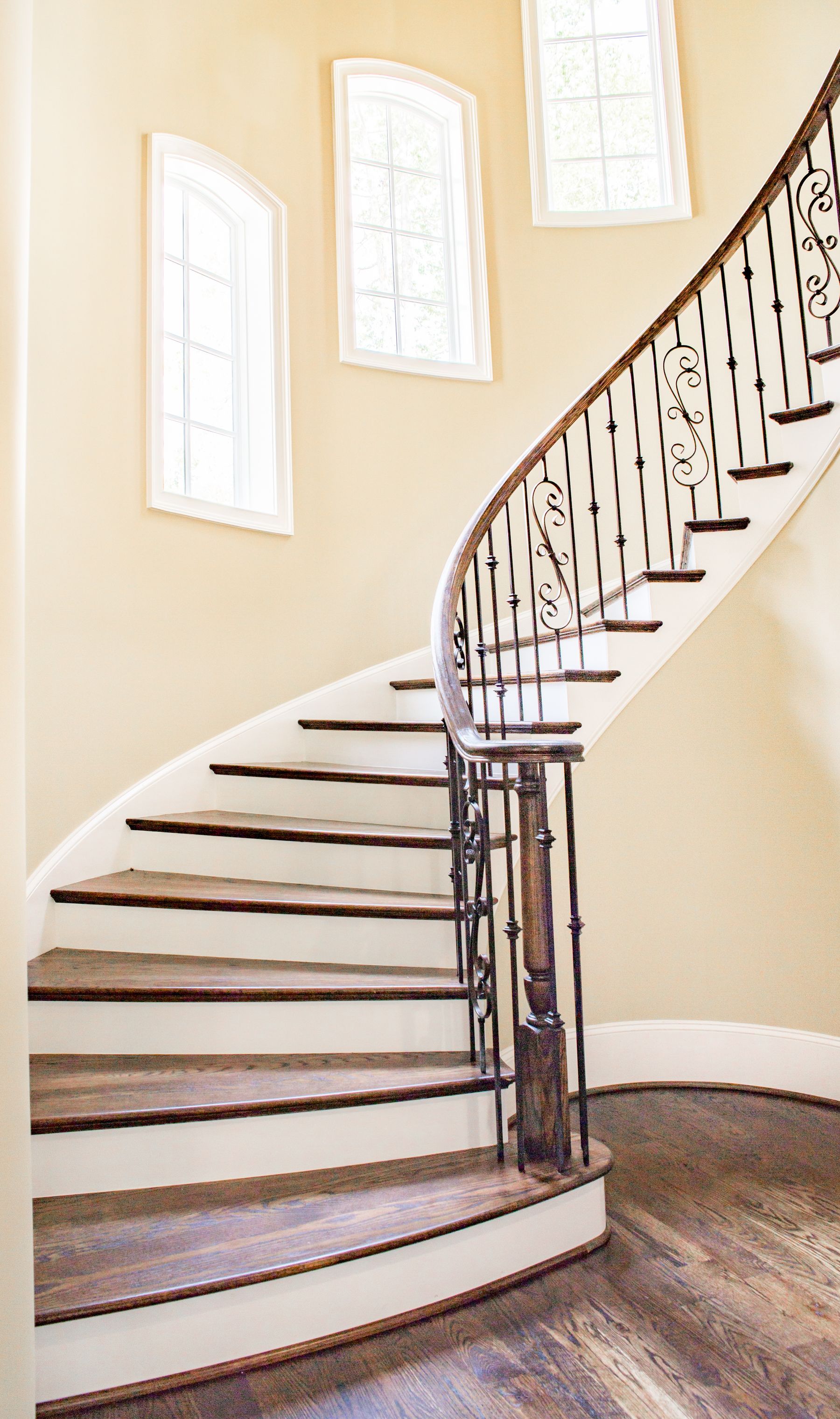 Fixed uPVC windows with Georgian bars lighting a stairwell